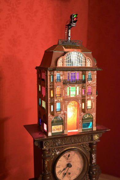 small house with light inside;