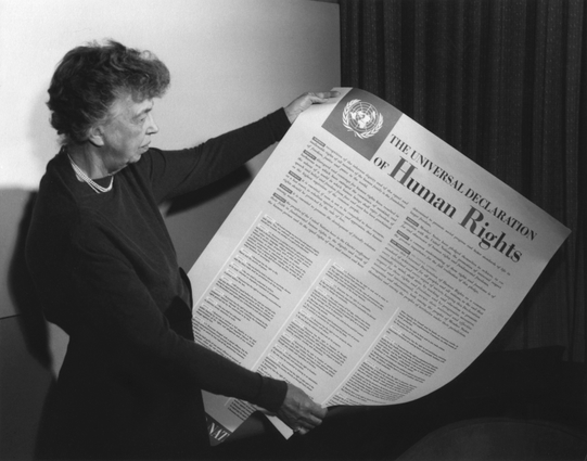 Eleanor Roosevelt holding poster of the Universal Declaration of Human Rights