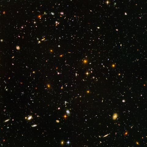 This view of nearly 10,000 galaxies is called the Hubble Ultra Deep Field. The snapshot includes galaxies of various ages, sizes, shapes, and colours. The smallest, reddest galaxies, about 100, may be among the most distant known, existing when the universe was just 800 million years old. The nearest galaxies - the larger, brighter, well-defined spirals and ellipticals - thrived about 1 billion years ago, when the cosmos was 13 billion years old.

The image required 800 exposures taken over the course of 400 Hubble orbits around Earth. The total amount of exposure time was 11.3 days, taken between Sept. 24, 2003 and Jan. 16, 2004.

Credit:

NASA, ESA, and S. Beckwith (STScI) and the HUDF Team

with bespoke animations to create an immersive, unforgettable journey from planet Earth to the furthest edges of our universe. The film is a first-of-its-kind collaboration between Grammy® award-winning composer and conductor Eric Whitacre, producers Music Productions, scientists and visualizers from the Space Telescope Science Institute and multi award-winning artists 59 Productions. The score and film paint the incredible story of the Hubble Deep Field. Turning its gaze to a tiny and seemingly dark area of space (around one 24-millionth of the sky) for an 11-day long period, the Hubble Space Telescope revealed over 3,000 galaxies that had never previously been seen, each one composed of hundreds of billions of stars.
