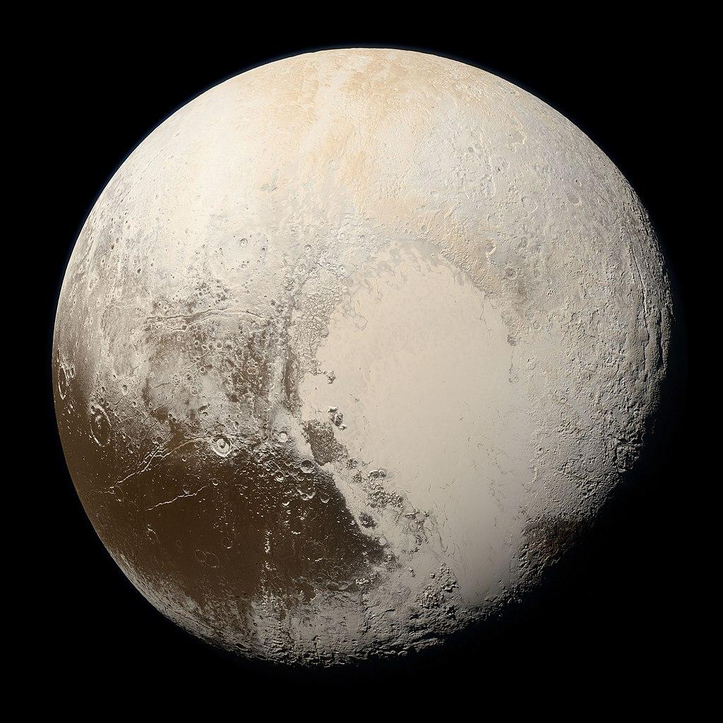 Pluto's image taken by New Horizons on July 14, 2015, from a range of 22,025 miles (35,445 kilometers). The striking features on Pluto are clearly visible, including the bright expanse of Pluto's icy, nitrogen-and-methane rich "heart," Sputnik Planitia. The natural-looking colors result from refined calibration of data gathered by New Horizons' color Multispectral Visible Imaging Camera (MVIC). The processing creates images that would approximate the colors that the human eye would perceive, bringing them closer to “true color” than the images released at the time of the encounter. The source single-color MVIC scan includes no added data from other New Horizons imagers or instruments. NASA/Johns Hopkins University Applied Physics Laboratory/Southwest Research Institute/Alex Parker - http://pluto.jhuapl.edu/Galleries/Featured-Images/image.php?page=1&gallery_id=2&image_id=543