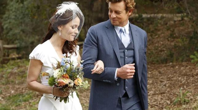 The Mentalist ended its series run with a two-part finale where Patrick Jane (Simon Baker) and Teresa Lisbon (Robin Tunney) get married. This mage is of the actors walking towards the ceremony, with Teresa carrying a bouquet.