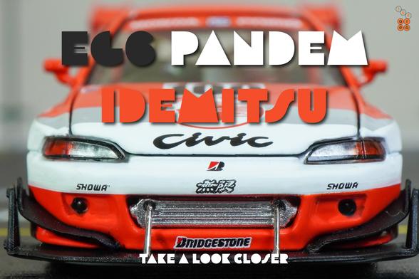 A close-up shot of Honda Civic EG6, Pandem, Idemitsu livery, All In Tuning 2024 Edition by Pop Race in 1:64 scale with 1:64 figure on AREA 164