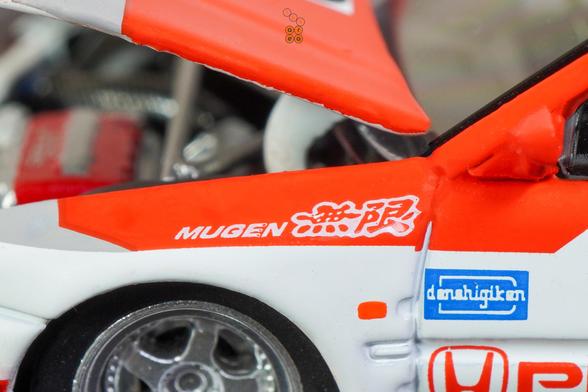 A close-up shot of Honda Civic EG6, Pandem, Idemitsu livery, All In Tuning 2024 Edition by Pop Race in 1:64 scale with 1:64 figure on AREA 164