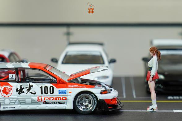 An open hood Honda Civic EG6, Pandem, Idemitsu livery, All In Tuning 2024 Edition by Pop Race in 1:64 scale with 1:64 figure on AREA 164