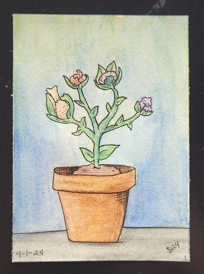 A potted plant that grows fried chicken drumsticks and donuts