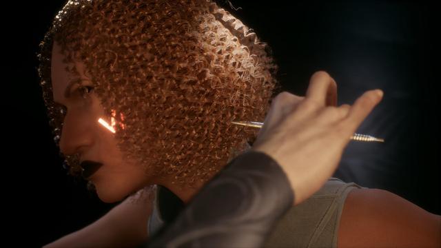 The Reverand Mother holding the Gom Jabbar to the player-character's neck.