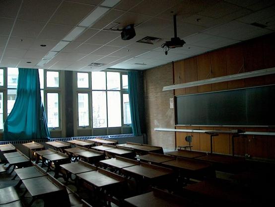 Wooden desks in classroom