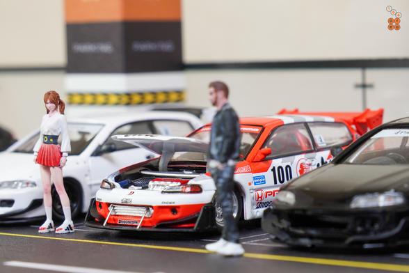 Few people and Honda Civic EG6, Idemitsu livery in 1:64 scale with 1:64 figures on AREA 164