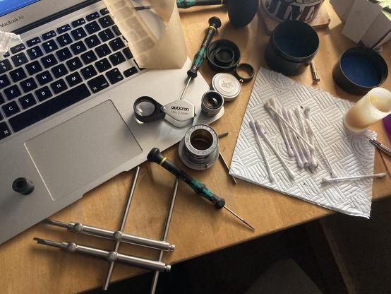 My desk at 6pm this afternoon - a lot of tools, ruined cotton wool buds, and small clots of 70 year old Soviet grease.