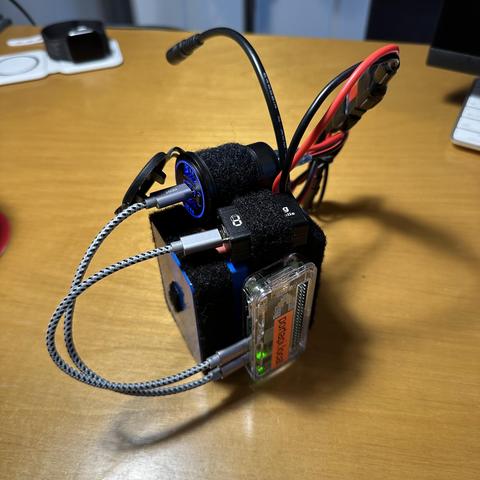 Bioenno 4.5Amp battery with Raspberry Pi W2, DigiRig Mobile and a USB adapter all attached with Velcro. 