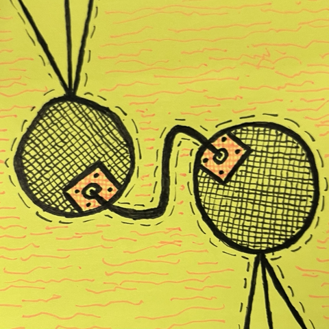 two heads connected by a cable on yellow background
