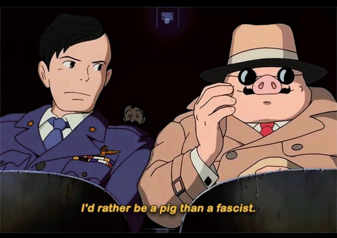 Screencap from the Ghibli film Porco Rosso, where they're sitting in the movie theatre and he says "I'd rather be a pig than a fascist."