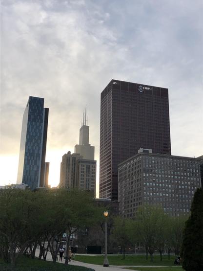 Sunbeams backlighting the Sears Tower. Grant Park is in the foreground. Technically, while this looks like a sunrise, it’s a sunset. The Sears Tower is in the south west Loop. 