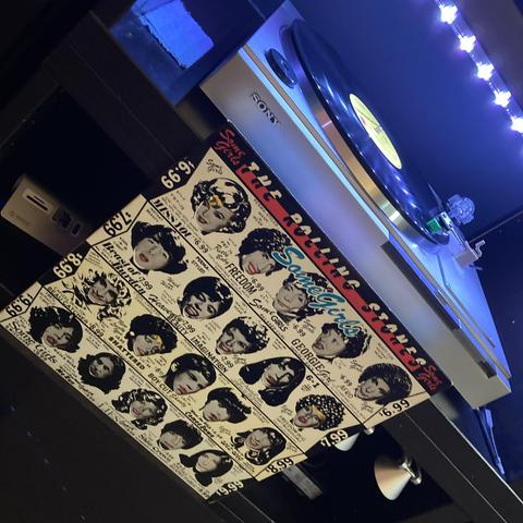 A tilty photo of the original Some Girls cover with the pull out insert featuring celebrities who would sue to have their images removed. 