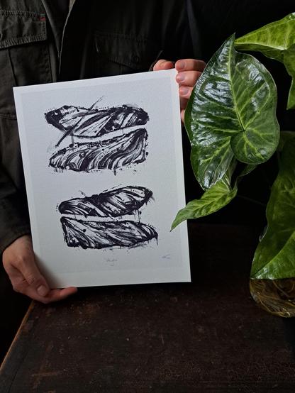 Biggest of the vertical prints held in hand