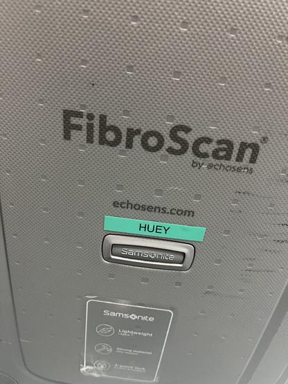 Picture of a portable FibroScan case labelled Huey
