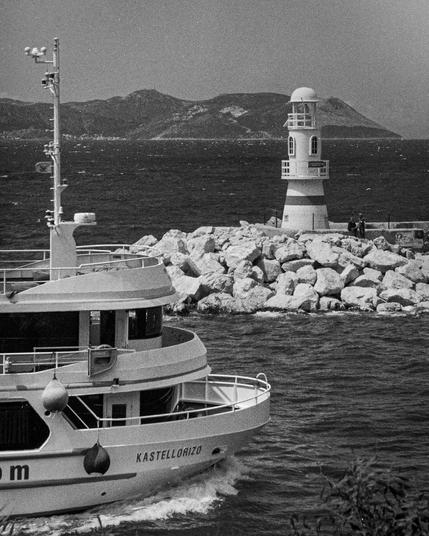 This shot was taken on a lazy morning with a Zorki-3 and a Jupiter-8 lens on Kodak TMax film, capturing a ferry to the Greek island of Kastellorizo, which can be seen on the horizon.