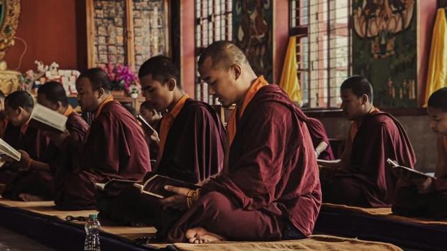 Group of monastics in temple.