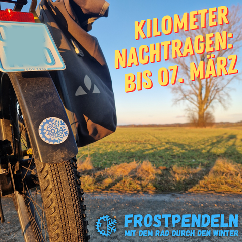 Heckansicht S-Pedelec mit Frostpendeln-Aufkleber auf Landstraße. Schrift auf Bild: Kilometer nachtragen: bis 07. März.