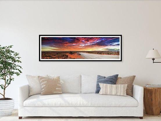 4 of my photographic images I stitched together in Photoshop to created a panoramic image of the red dry outback desert in Australia with an amazing red cloud sunset. We were traveling between Burra, South Australia and Broken Hill, New South Wales, Australia.  By Kaye Menner Photography.
