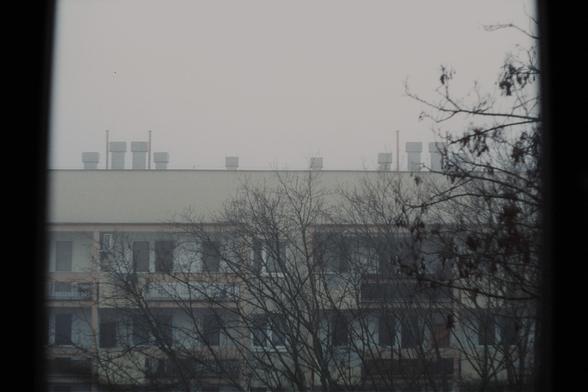 Block of flats in fog.

