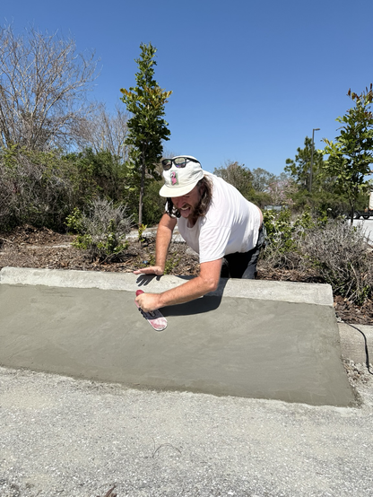 Me having a blast while finishing a concrete skate ramp
