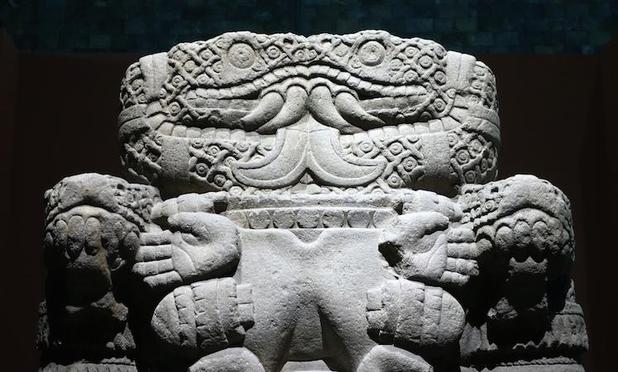 the  face of the deity, and her chest, very frightening looking 