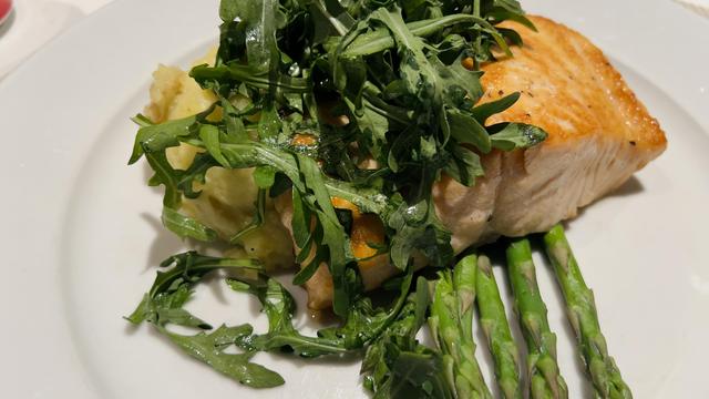 salmon with mashed potatoes and steamed asparagus & arugula