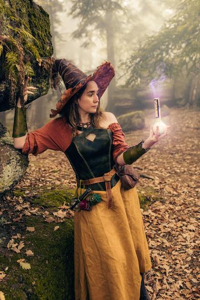 cosplay fantastic picture of a witch. costume is leather and fabric made and worn by @inkdustrielle 