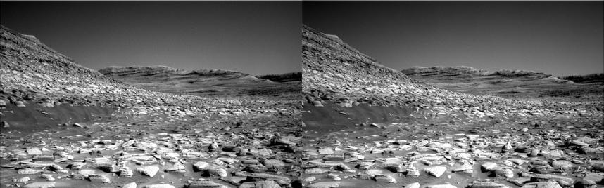 a dual left/right stereoscopic pair of black and white photographies displaying a Martian landscape. This dual image is intended to be used to obtain a Stereo3D rendition of the scene through parallel viewing, and not cross-eyed viewing.