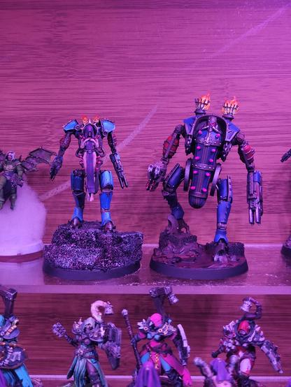 Size comparison of two penitent engine proxies from the same artist