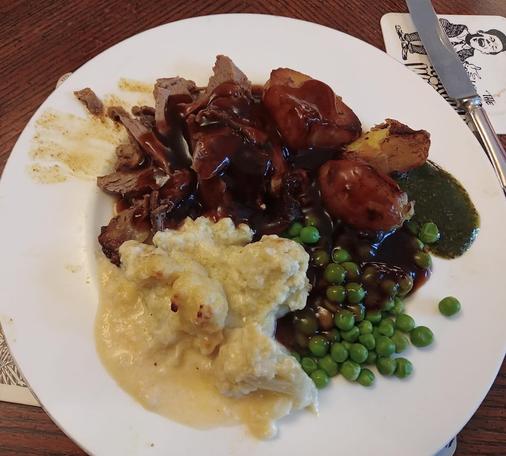 Lamb Shoulder, Cauliflower Cheese, Roast Potatoes, Peas and Gravy