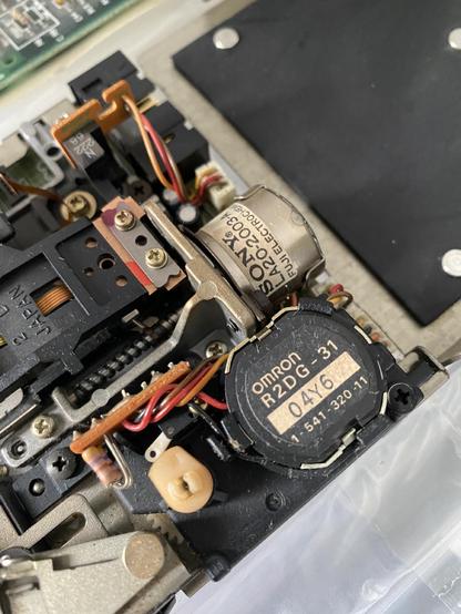 The Omron eject mechanism of the floppy drive