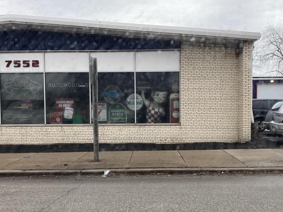 A shop with a "Big Boy" in the window.