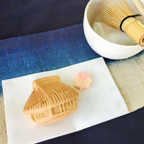 Monaka in the shape of a thatched cottage.