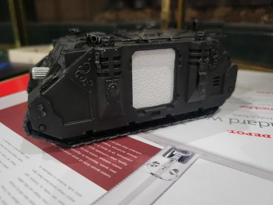 Primed Rhino with white speaker fabric