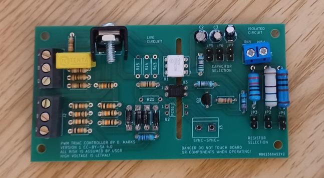 A picture of the assembled Triac Control PCB showing the input power, motor to be controlled, and the input control signal.