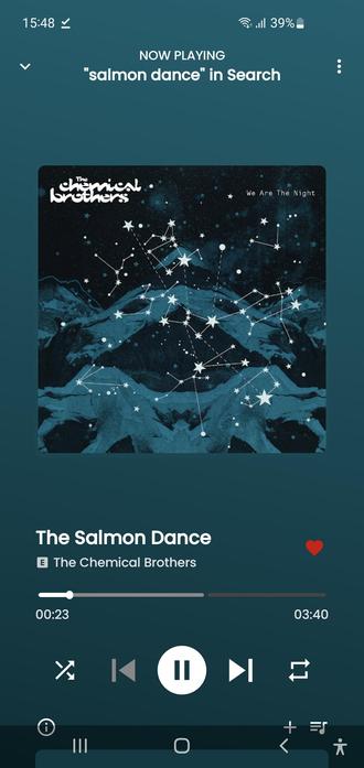 Music player screen showing "The Salmon Dance" by The Chemical Brothers. Album cover features a constellation pattern on a dark blue background.