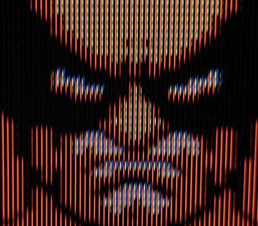 A close up of Wolverine's face from the NES game "Wolverine" on Sony Trinitron CRT TV.