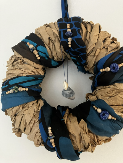 Home made wreath with blue fabric and beads