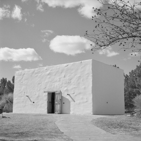 A black-and-white film photo. A replica of a 1780’s dwelling found in Zapata County, Texas showcased at the National Ranching Heritage Center in Lubbock, Texas. Saturday, February 15, 2025.