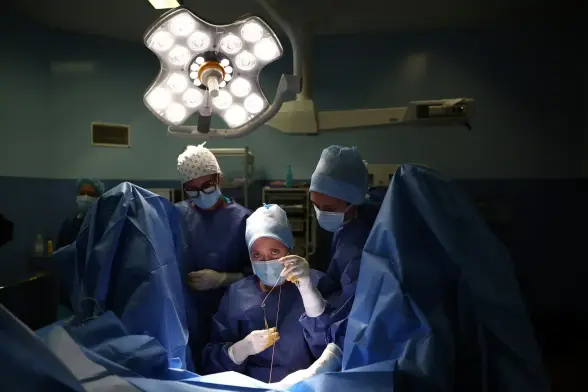 A reconstructive surgery on FGM victim in progress.