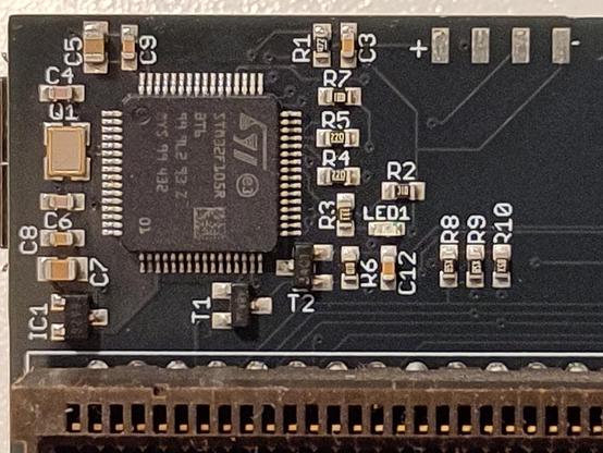 Closeup shot of the ST microcontroller area used for USB keyboard connectivity on the Imperator CD32 Riser.