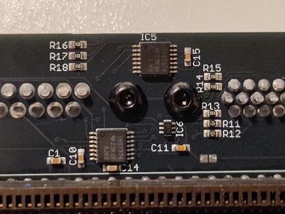 Closeup shot of the two THS7374 video signal amplifiers, used for the DSub 15 VGA and the Amiga 23 Pin RGB ports on the Imperator CD32 Riser.
