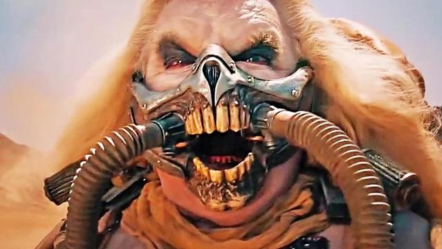 Grimacing horror-face of Immortan Joe, character in the Road Warrior movies.