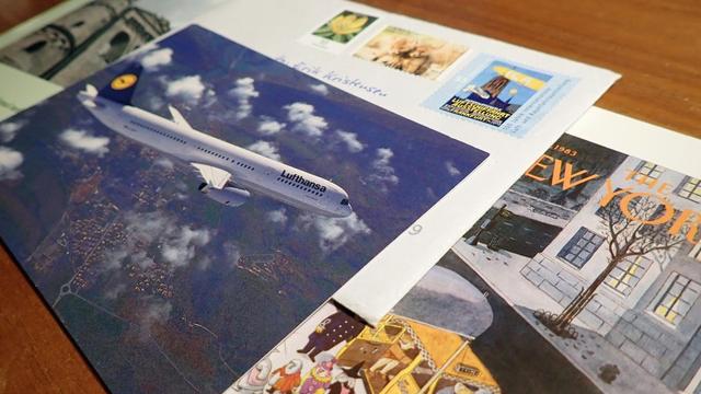 Envelope / Letter and postcards on a table