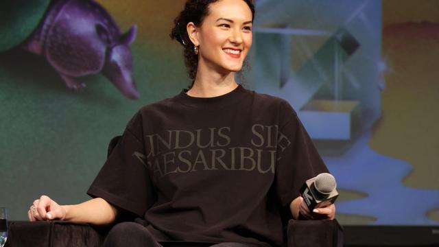 Jay Graber wearing a t-shirt that reads Mundus sine Caesaribus which translates to  A world without Caesars.
