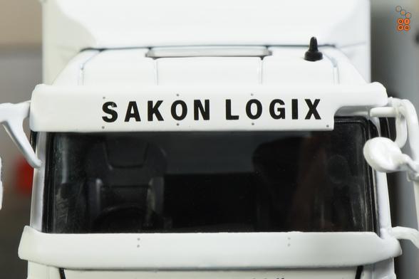 A close-up shot of Mitsubishi Fuso Super Great, LB-Trucks by GCD in 1:64 scale on AREA 164