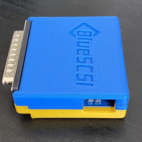 Side view of a BlueSCSI. The 3D printed shell is blue and yellow, in the colors of the Ukrainian flag. 