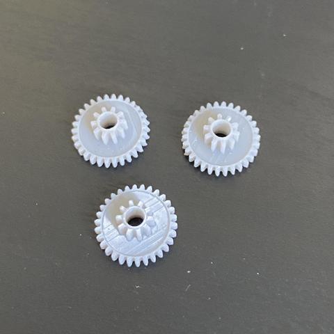 Three 3D printed replacements for the infamous Omron eject mechanism wheel that normally breaks in the Macintosh Plus floppy drive.
